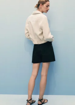 Denim shorts with frayed hem