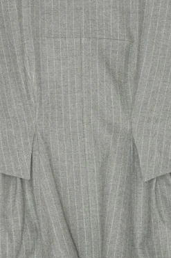 PEPLUM TOP WITH LONG SLEEVES